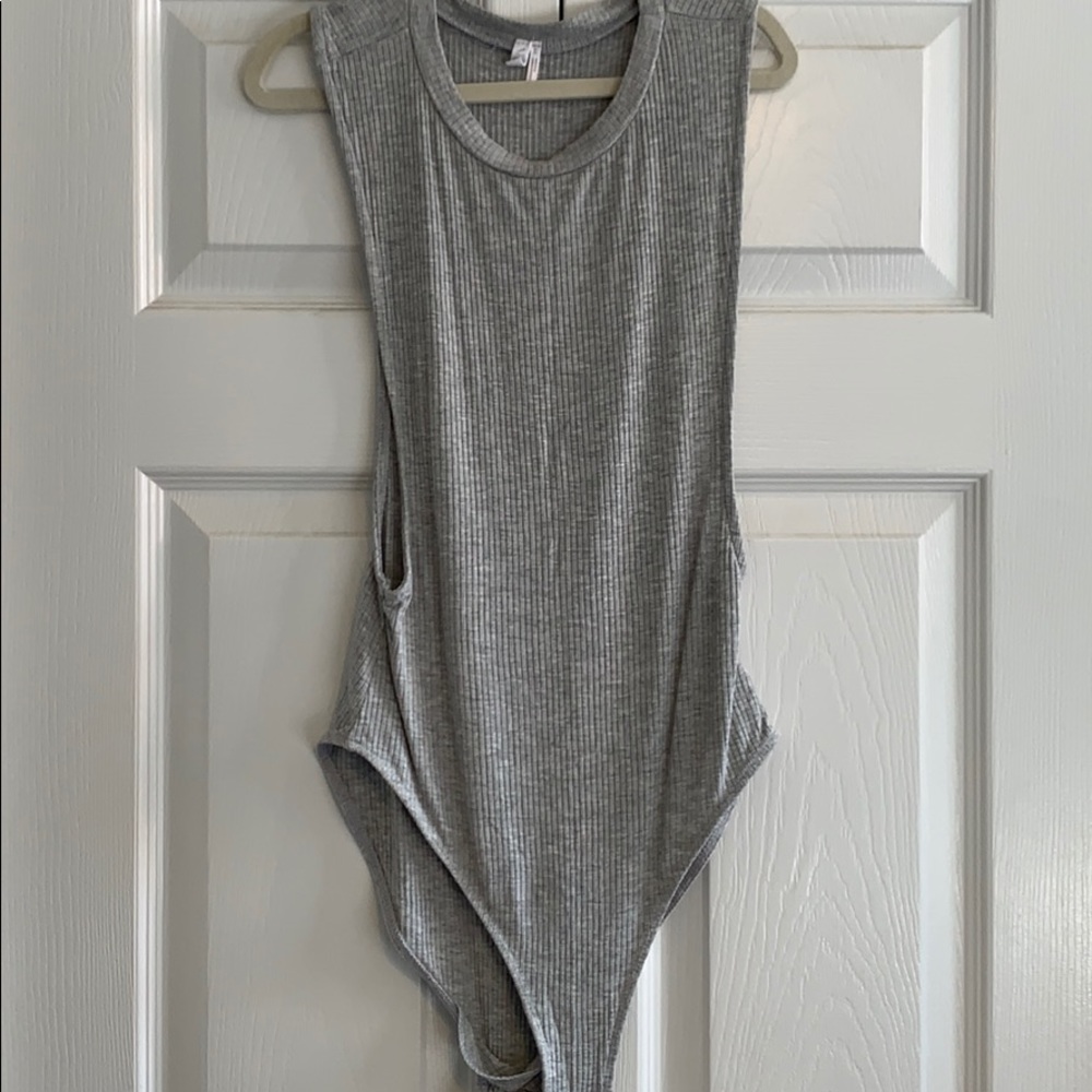 Gray ribbed bodysuit with low cut sides